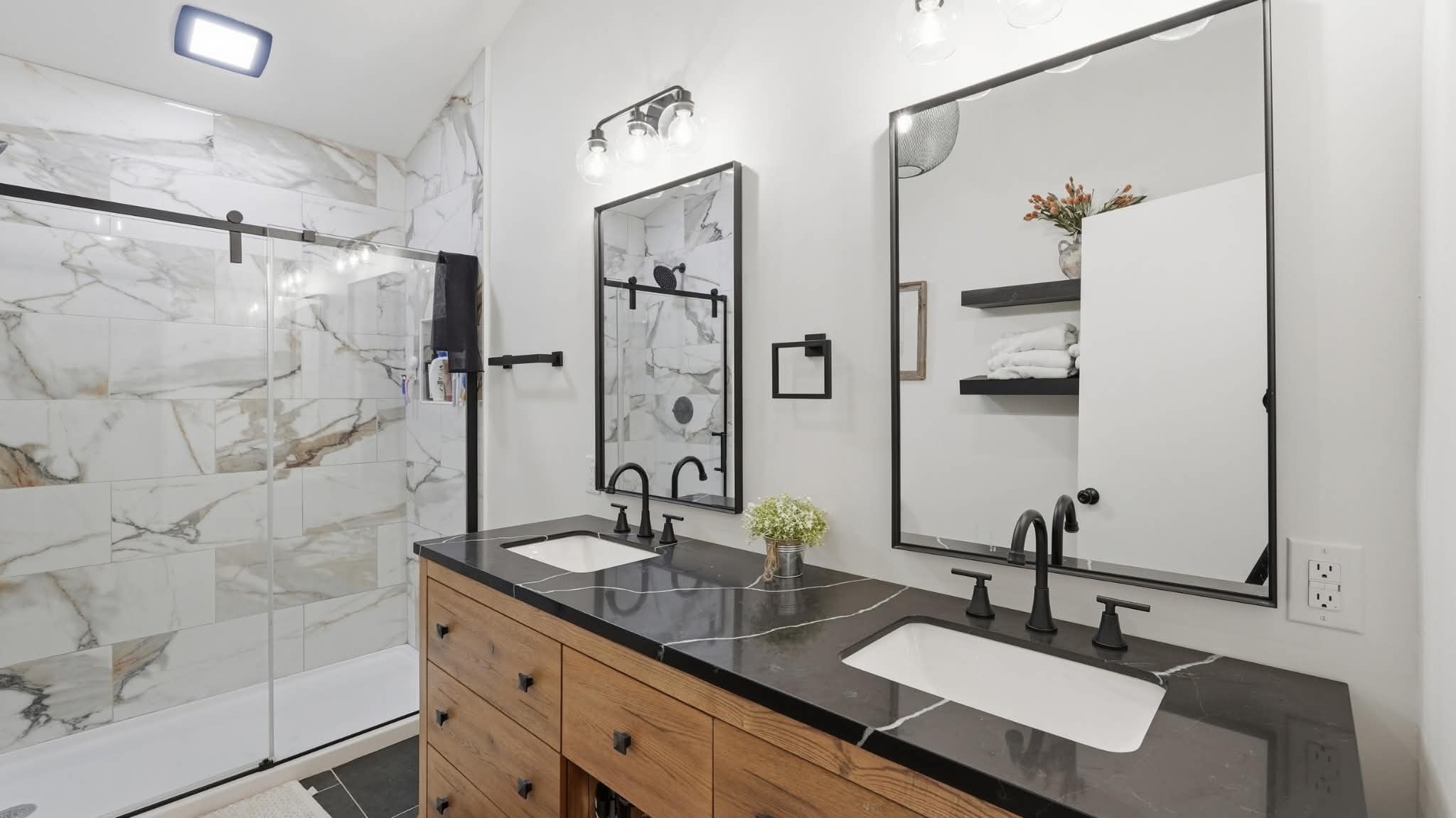 Primary bathroom renovation with marble tile
