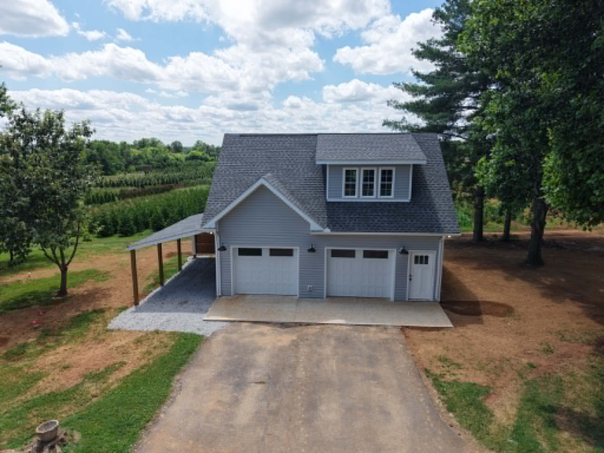 Detached garage and apartment addition exterior